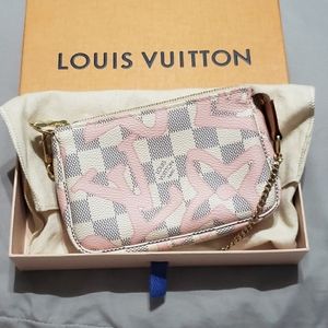 Louis vuitton tahitienne mini pochette acc…